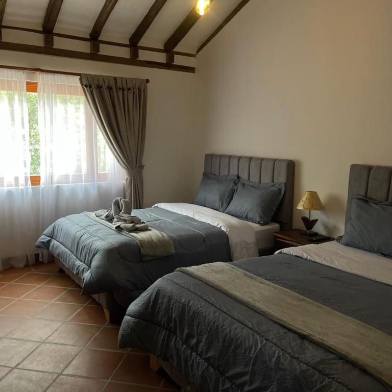 La Estancia Colonial - Three-Bedroom House - 29