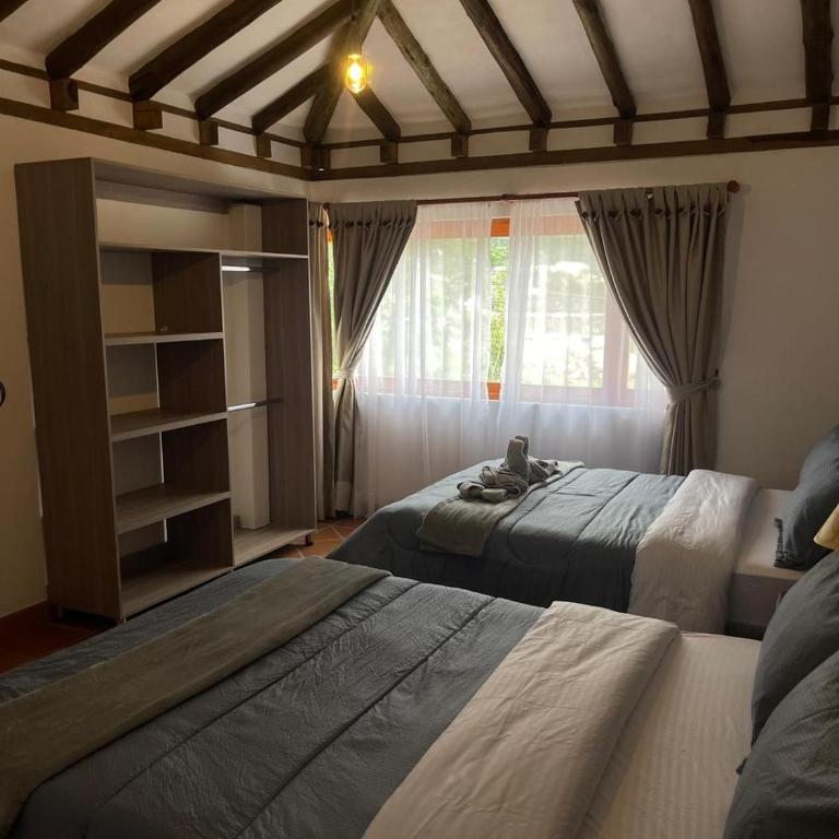 La Estancia Colonial - Three-Bedroom House - 30