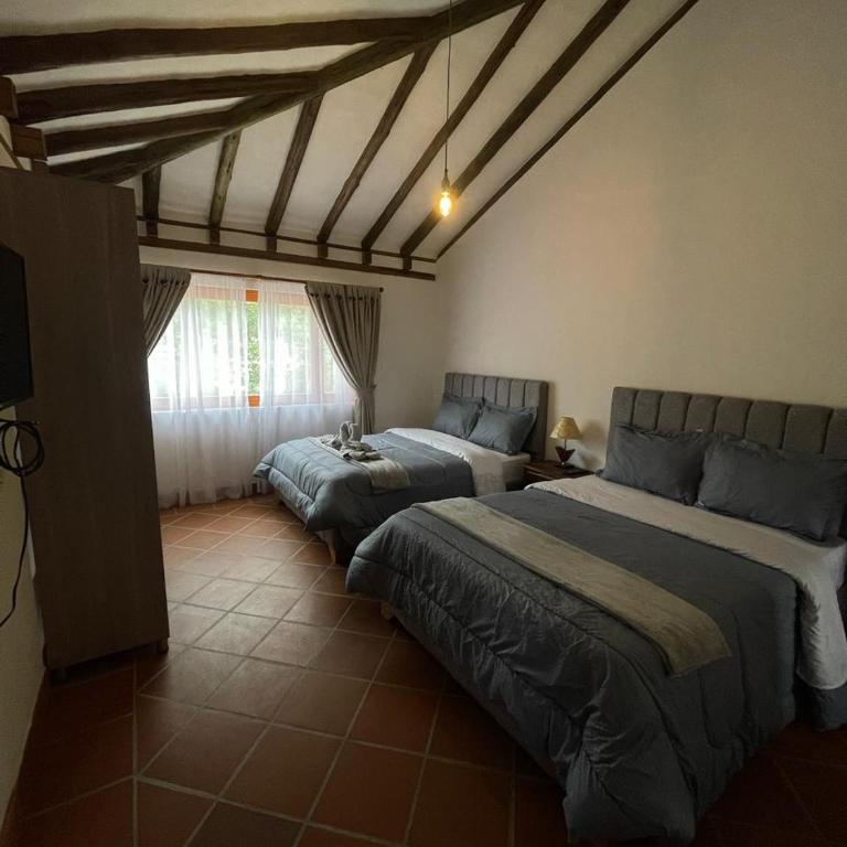 La Estancia Colonial - Three-Bedroom House - 36