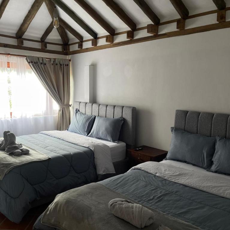 La Estancia Colonial - Three-Bedroom House - 3