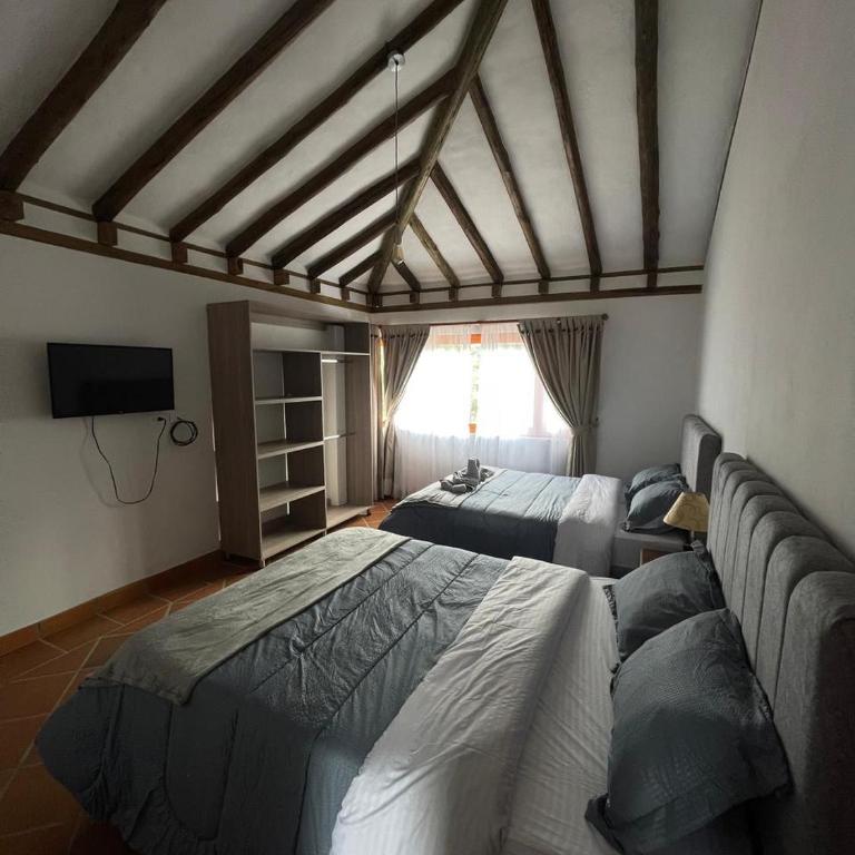 La Estancia Colonial - Three-Bedroom House - 43