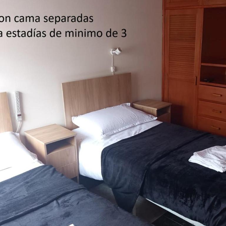 Cuarto con Cama King y Smart TV en apartamento compartido en Tunja - Habitación Doble Grande - 1 o 2 camas - 2