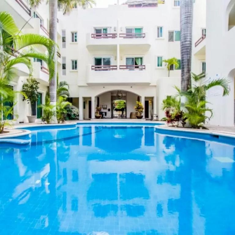 Playa Kaan Condominiums- Unit 22 - Apartment with Pool View - 1
