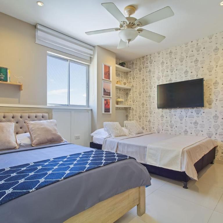 Bocagrande Excelente Ubicacion Apto CONFORT con una gran vista al MAR y PLAYAS - Two-Bedroom Apartment - 16