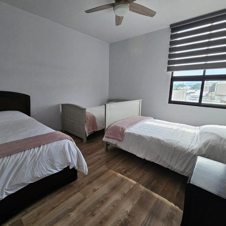 Departamento moderno cerca de Distrito La Perla, Guadalajara - Apartamento de 3 dormitorios - Planta Alta - 14