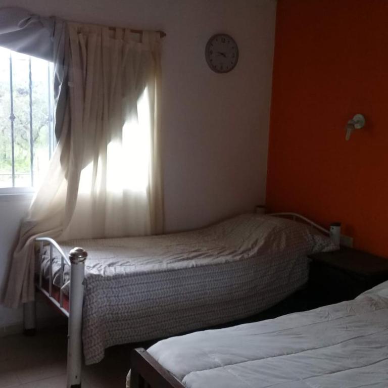 Casa con hermoso parque y pileta - Casa de 2 dormitorios - 16