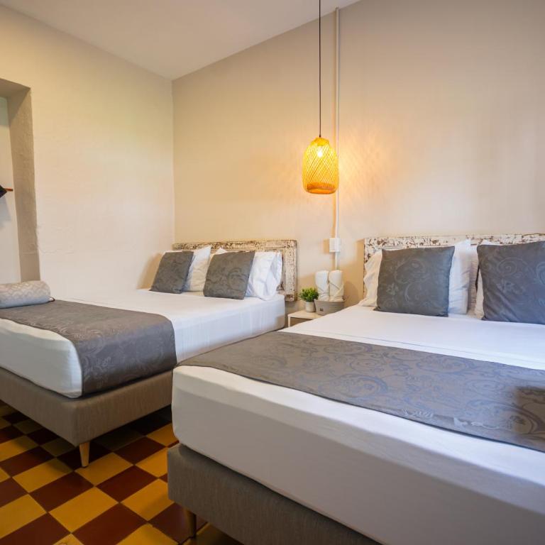 CASA HOTEL LAS HORTENSIAS - Queen Room with Two Queen Beds - 1