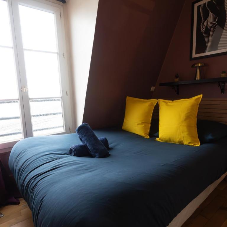 APPARTEMENT CHALEUREUX ARTISTIQUE QUARTIER GARE DU NORD - GARE DE L'EST et GRANDS BOULEVARDS - Appartement 1 Chambre - 33