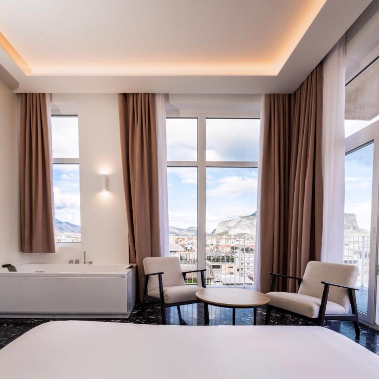 Skyline Boutique Hotel - Suite Queen con Vasca Idromassaggio - 8