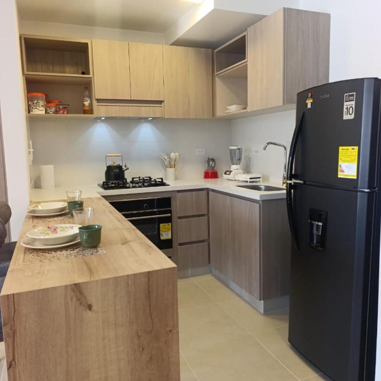 2 Piscinas en condominio y BBQ privado - Three-Bedroom Apartment - 9