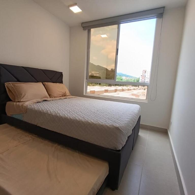 2 Piscinas en condominio y BBQ privado - Three-Bedroom Apartment - 12