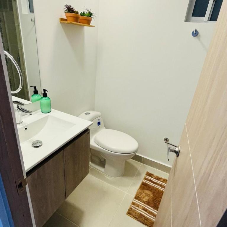 2 Piscinas en condominio y BBQ privado - Three-Bedroom Apartment - 13
