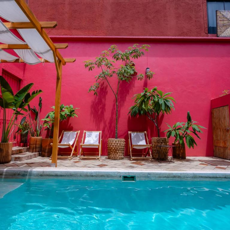 Hotel Casa de Arte Oaxaca - Habitación con cama extragrande y vistas a la piscina - 6