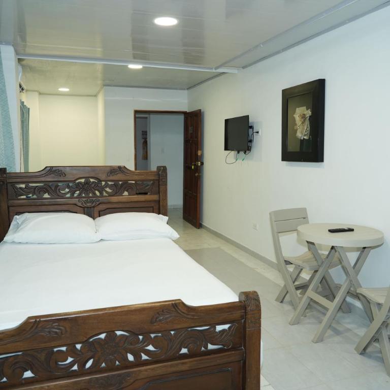 Jhonny Cay Suites - Habitación Cuádruple Estándar - 1
