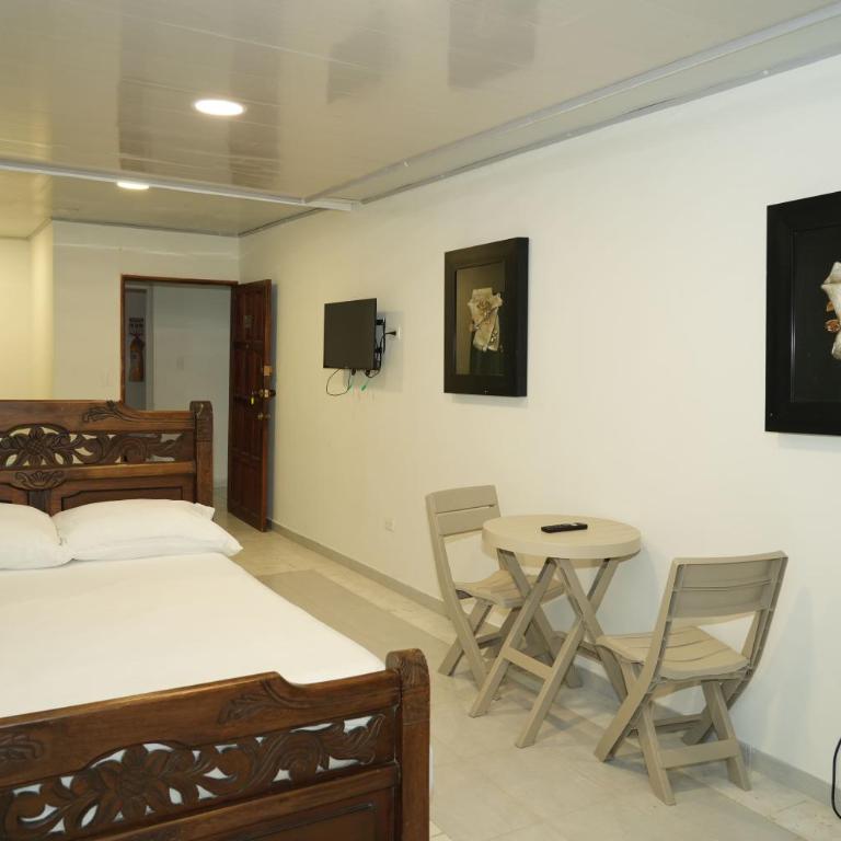 Jhonny Cay Suites - Habitación Cuádruple Estándar - 2