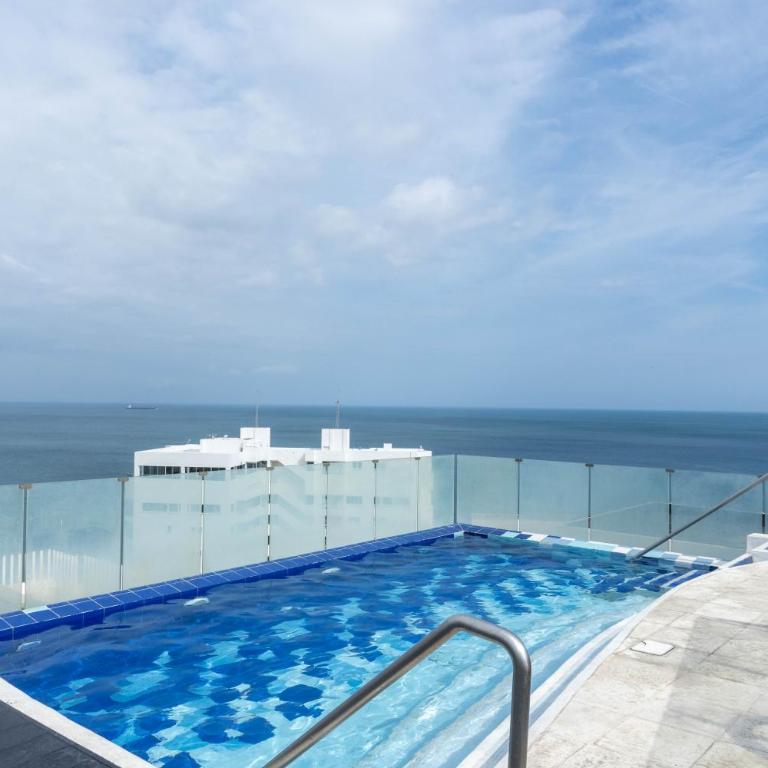 Apto con vista al mar, piscinas, Jacuzzis y Club de Playa en Reserva del Mar - Four-Bedroom Deluxe Apartment - 32