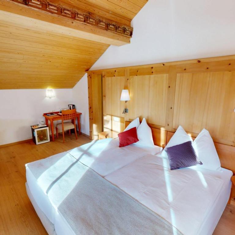 Schweizerhaus Swiss Quality Hotel - Deluxe Doppelzimmer mit Bergblick - 6