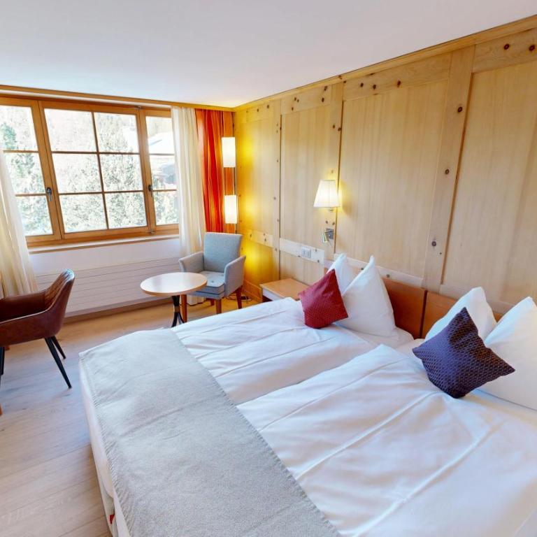 Schweizerhaus Swiss Quality Hotel - Deluxe Doppelzimmer mit Bergblick - 15