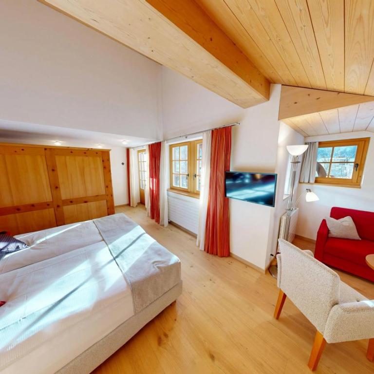 Schweizerhaus Swiss Quality Hotel - Deluxe Doppelzimmer mit Bergblick - 11