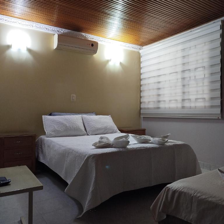 Valle Suites, la mejor zona - Habitación Doble con baño privado - 1 o 2 camas - 6