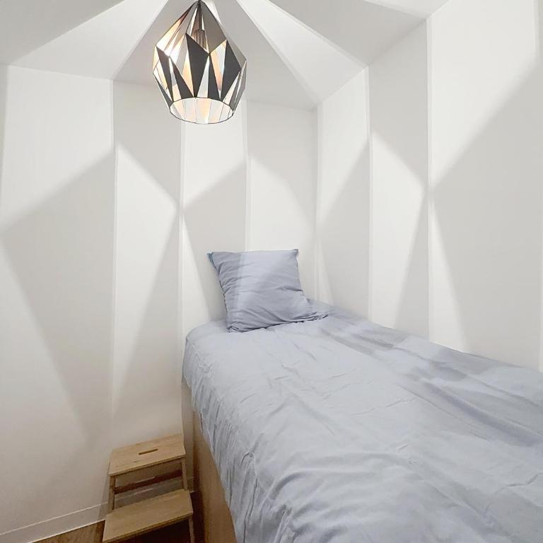 Studio avec canapé lit 2 places dans pièce de vie et lit une place dans coin nuit - Apartment mit 1 Schlafzimmer - 26