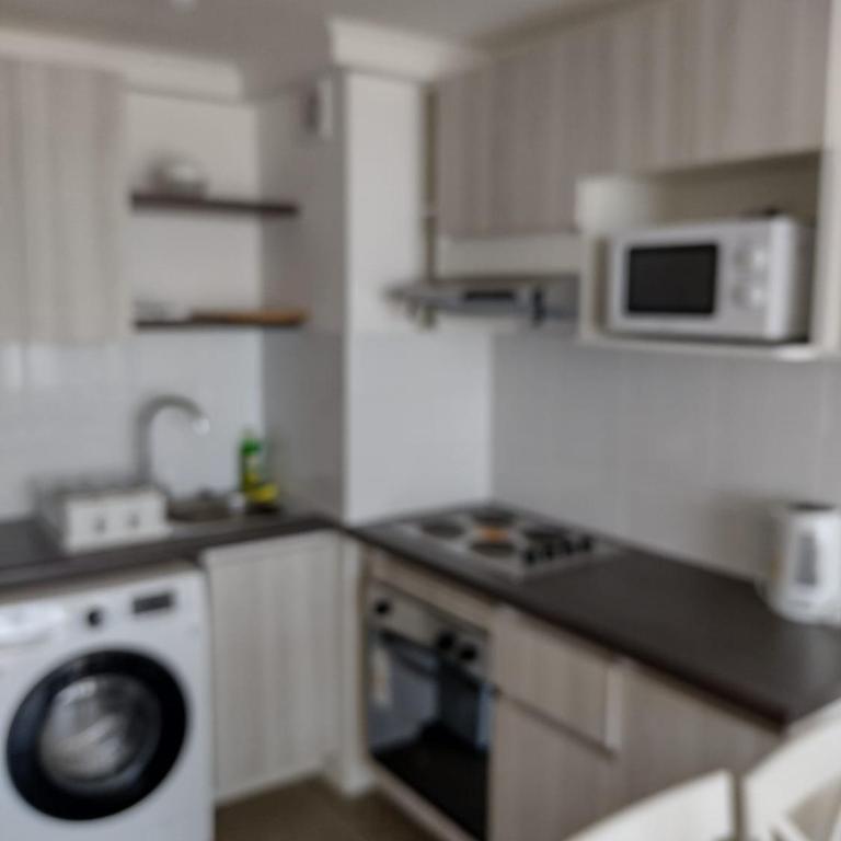 Departamento a pasos de la playa Condominio Pacific Blue - Two-Bedroom Apartment with Balcony and Sea View - 5