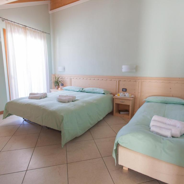 Residence Hotel Raggio Di Luce - Appartamento Deluxe con 2 Camere da Letto e Balcone - 4