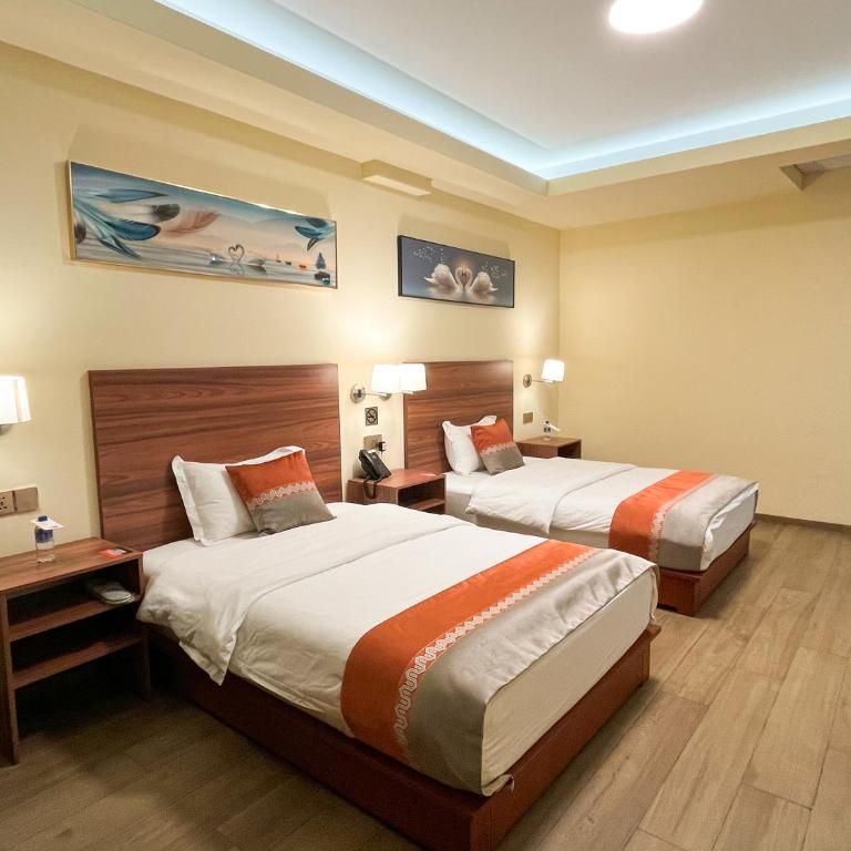 SM HOTEL Plus - Habitación Doble - 2 camas dobles - 1