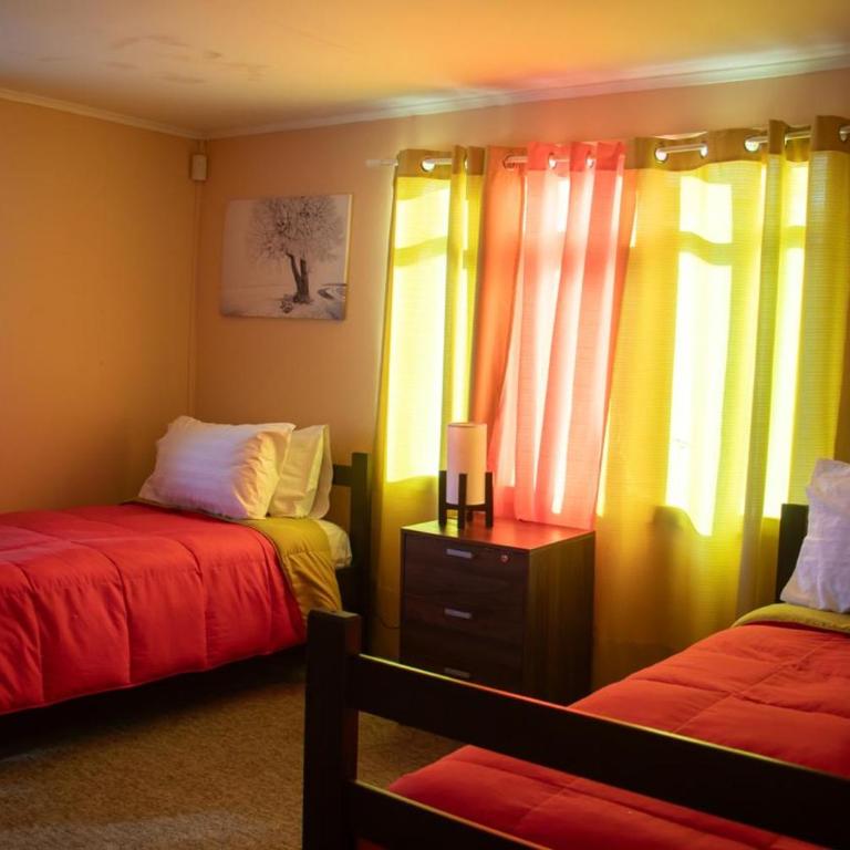 Hostal Turpial Patagonia - Triple Room with Shared Bathroom - 1