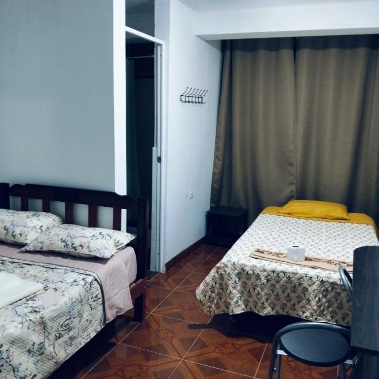 Alojamiento Santo Domingo - Huarmey - Habitación Doble con baño privado - 2 camas - 1