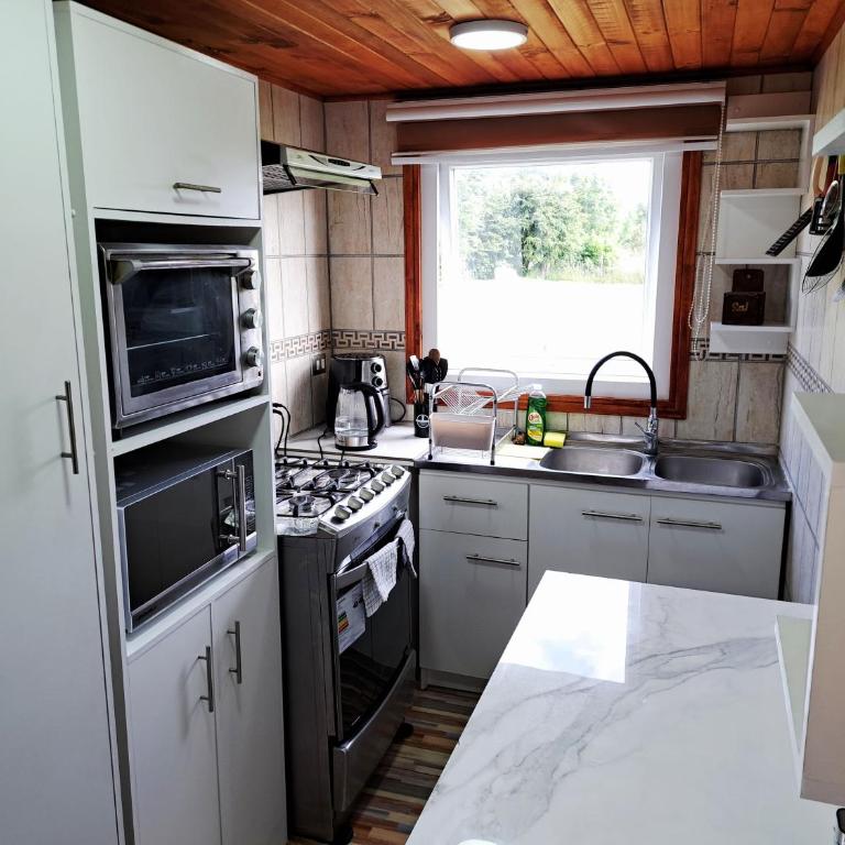 Tinaja Caliente incluida en Parcela Completa con Casa, Quincho, Canchas y Juegos - Three-Bedroom House - 34