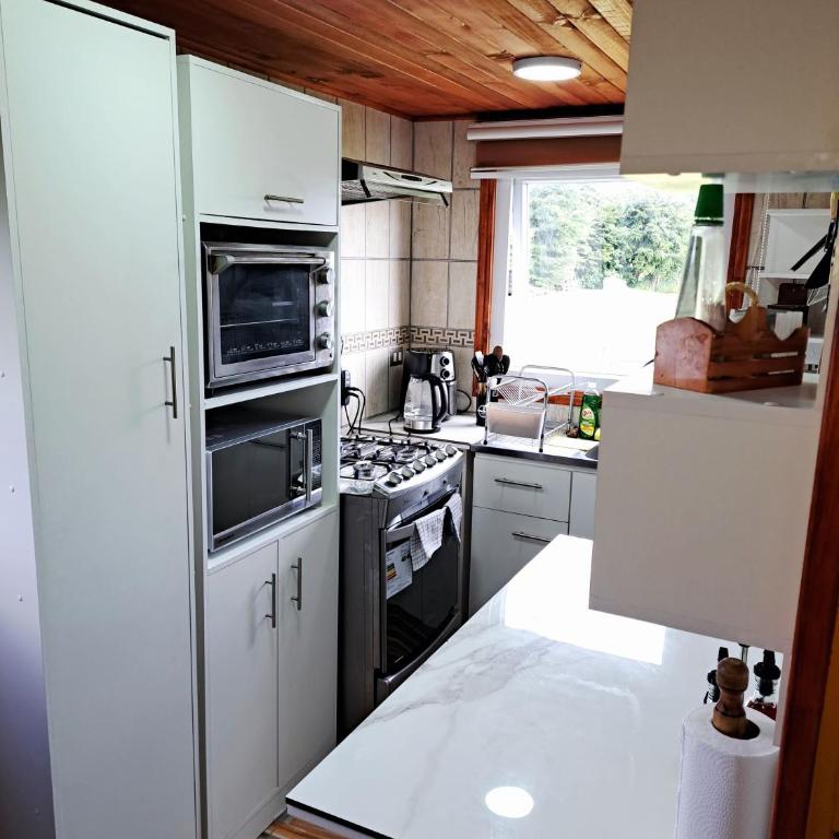 Tinaja Caliente incluida en Parcela Completa con Casa, Quincho, Canchas y Juegos - Three-Bedroom House - 35