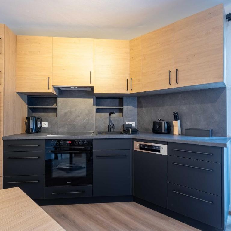 Alpenglück Apartments by we rent, JOKERCARD INCLUDED - Two-Bedroom Apartment with Garden View - 26