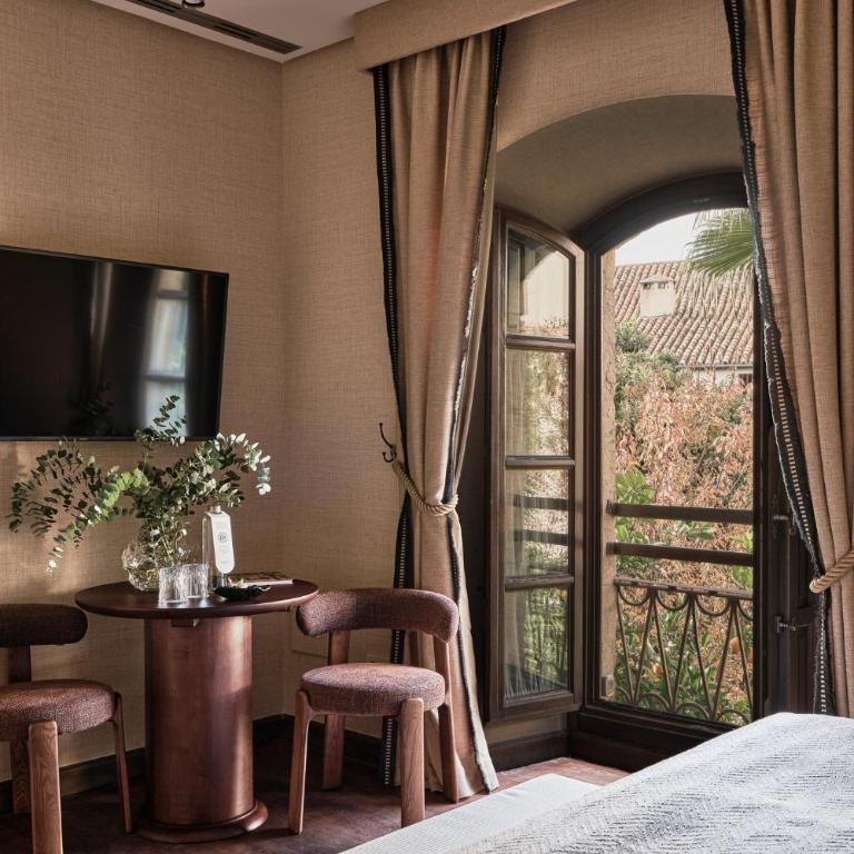 Hospes Palacio del Bailio, a Member of Design Hotels - Habitación con cama extragrande y vistas al jardín - 2