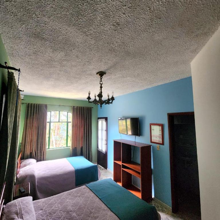 Hospedaje Mirador de Pueblo viejo - Habitación Cuádruple con baño privado - 1