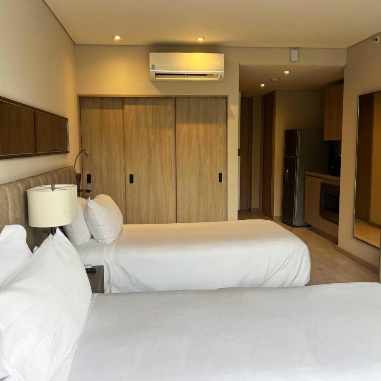 York Medellin, Curio Collection by Hilton - Habitación Doble Superior con zona de cocina - 2 camas - 3