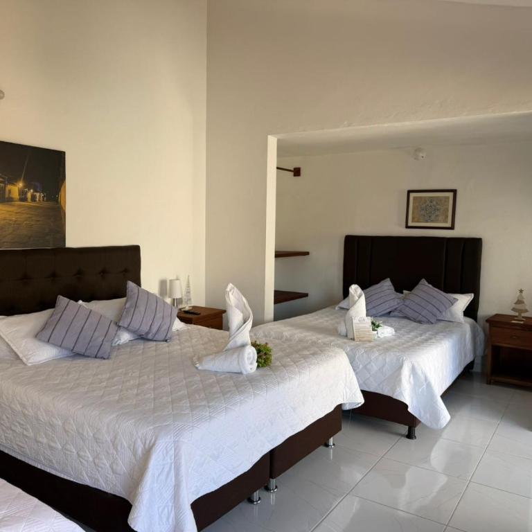 Casa Hotel El Encanto de Villa - Quadruple Room with Garden View - 3