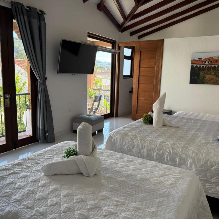 Casa Hotel El Encanto de Villa - Quadruple Room with Garden View - 2