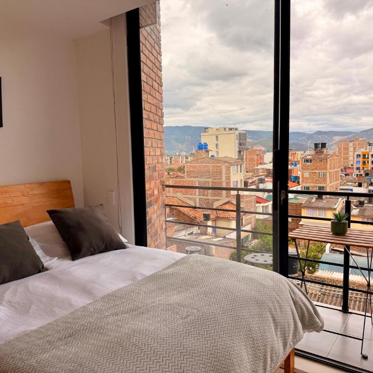 Loft Elegante con Vista a la Ciudad - Apartamento de 1 Dormitorio con balcón y vistas a la ciudad - 2