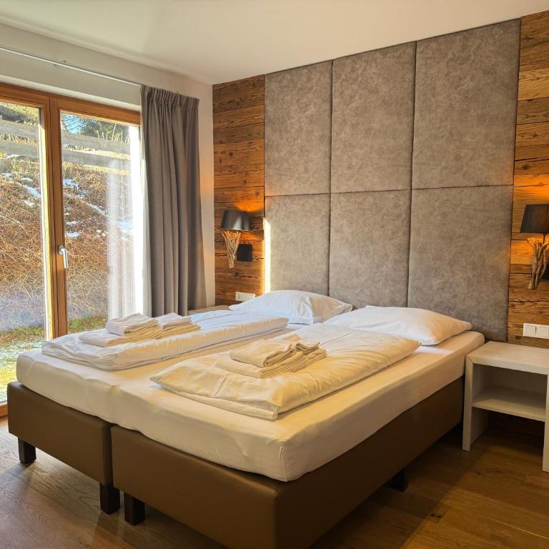 Mountain Lodge Leogang- Luxus Apartement, Terrasse, Garten, Kamin - Apartment mit 3 Schlafzimmern - 3