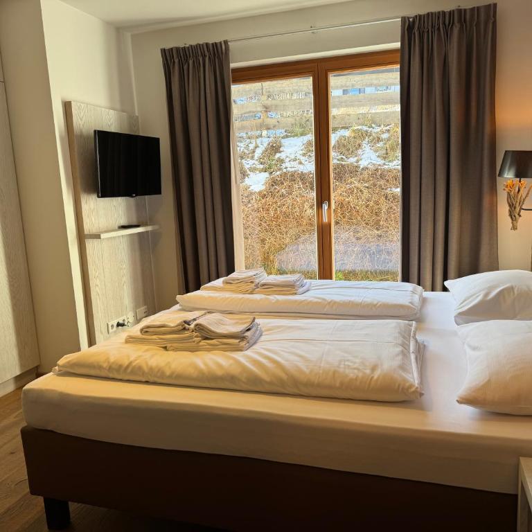 Mountain Lodge Leogang- Luxus Apartement, Terrasse, Garten, Kamin - Apartment mit 3 Schlafzimmern - 4