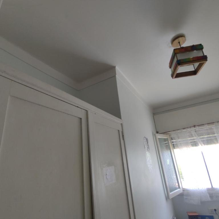Departamento Villa Gesell - Two-Bedroom Apartment with Garden View - 9