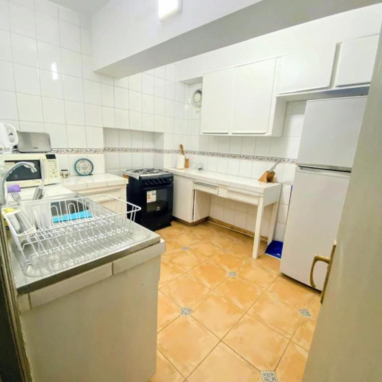 Departamento Avenida Marina frente al Casino - Three-Bedroom Apartment - 11