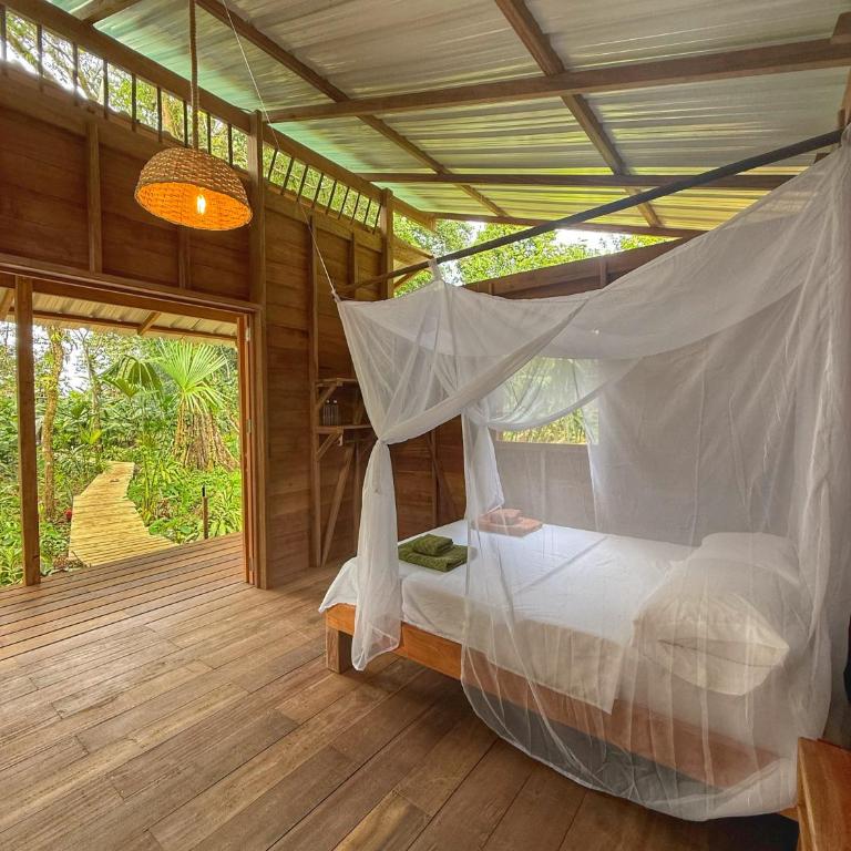 Madre Selva Eco Lodge - Habitación Triple con vistas al jardín - 4