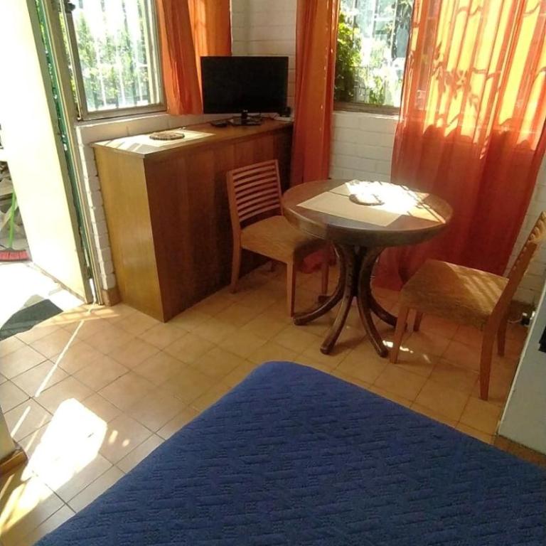 Estacionamiento, terraza y patio - Vacation Home - 49