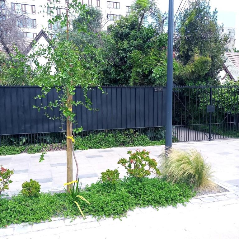 Estacionamiento, terraza y patio - Vacation Home - 75