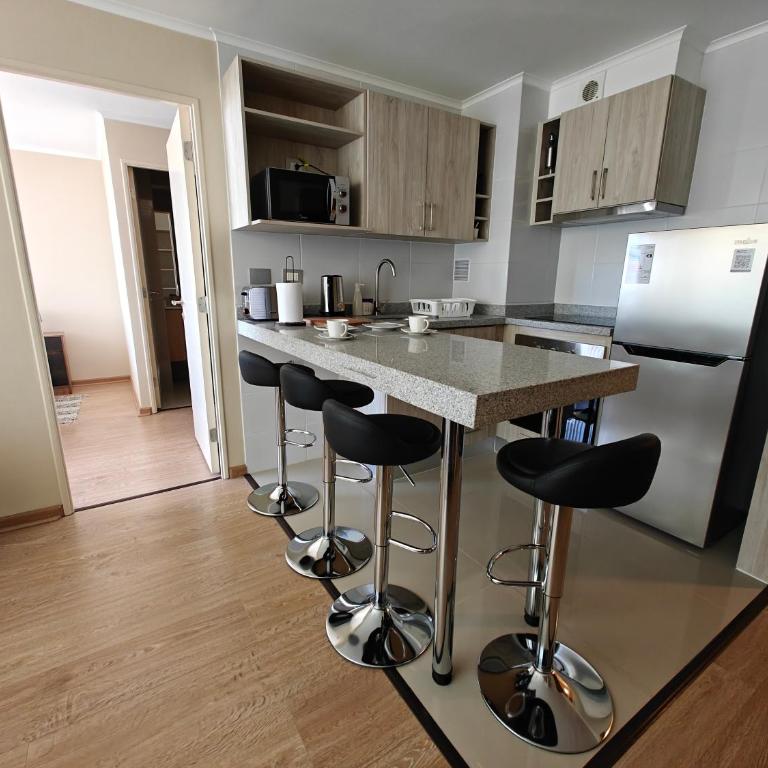 Amplio departamento en pleno centro de Chillán con estacionamiento privado - Two-Bedroom Apartment - 11