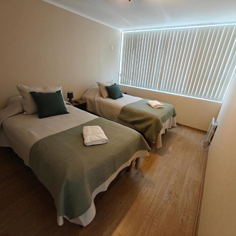 Amplio departamento en pleno centro de Chillán con estacionamiento privado - Two-Bedroom Apartment - 7