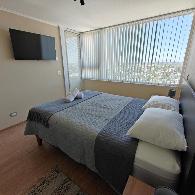 Amplio departamento en pleno centro de Chillán con estacionamiento privado - Two-Bedroom Apartment - 4
