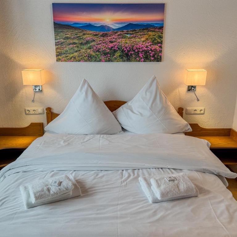 Haus Breitenberg im Allgäu - inklusive Bergbahnen und Skipass - Deluxe Apartment mit 2 Schlafzimmern und Gartenblick - 19